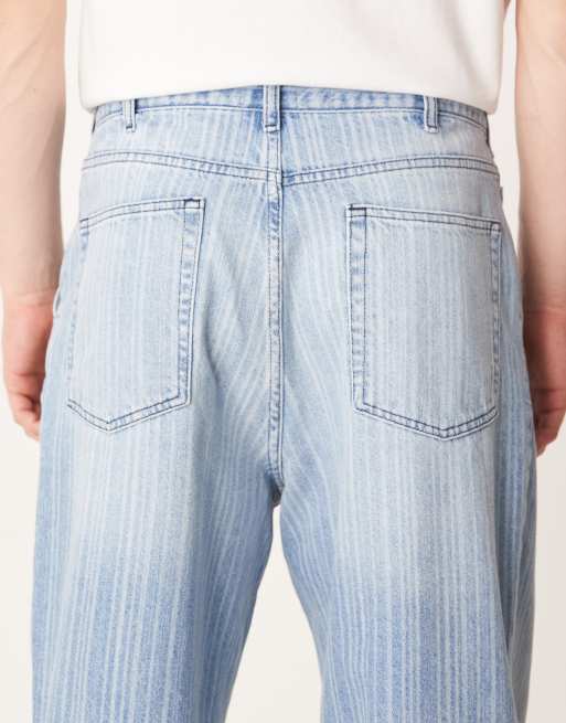 ASOS DESIGN - Ruimvallende toelopende gestreepte jeans in lichte wassing blauw, 4 van 5