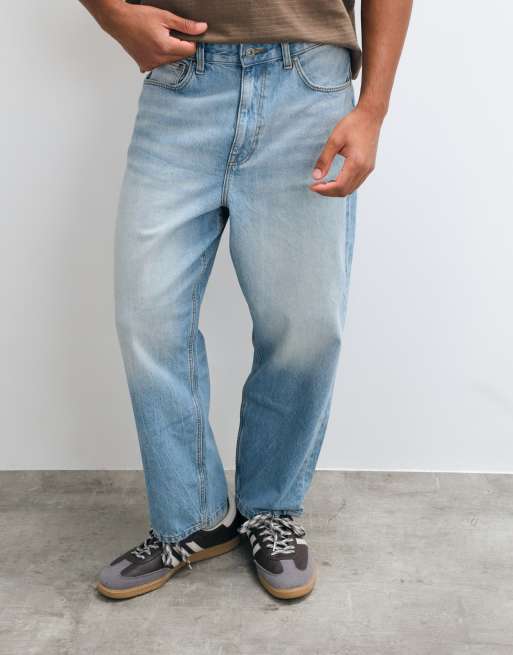 ASOS DESIGN - Ruimvallende, toelopende jeans met vintage lichtblauwe wassing, 1 van 5