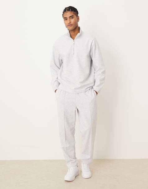 ASOS DESIGN - Ruimvallende, toelopende joggingbroek van scubastof met plat gestikte plooitjes in grijs, deel van co-ord set - view 1