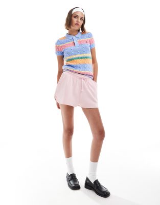 ASOS DESIGN - Runner-Shorts aus Sweatshirt-Stoff in verwaschenem Rosa