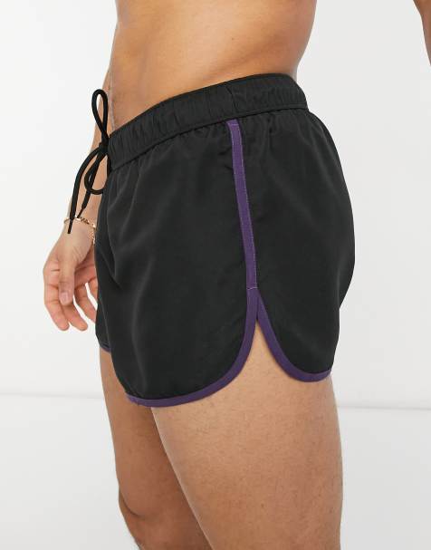 ASOS DESIGN runner swim shorts in black with contrast binding - view 1