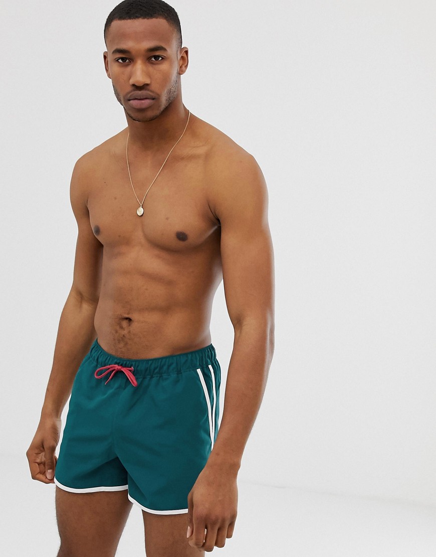 ASOS DESIGN runner swim shorts in dark green
