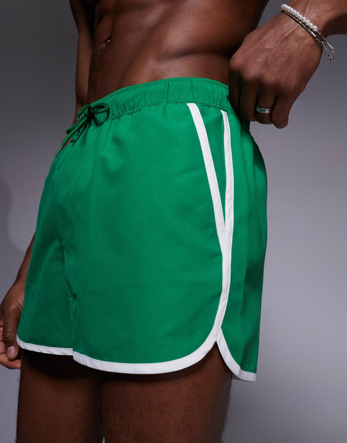 ASOS DESIGN runner swim shorts in short length in bright green