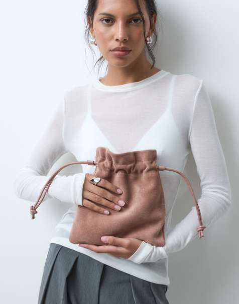 ASOS DESIGN ruskindspung med hank i pink - view 1