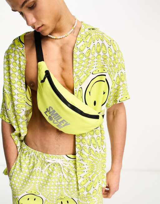 ASOS DESIGN Sac banane logo Love m tallis en collaboration