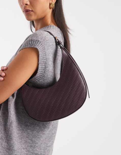 ASOS DESIGN - Sac porté épaule asymétrique et incurvé effet tressé avec boucle - Bordeaux - view 1