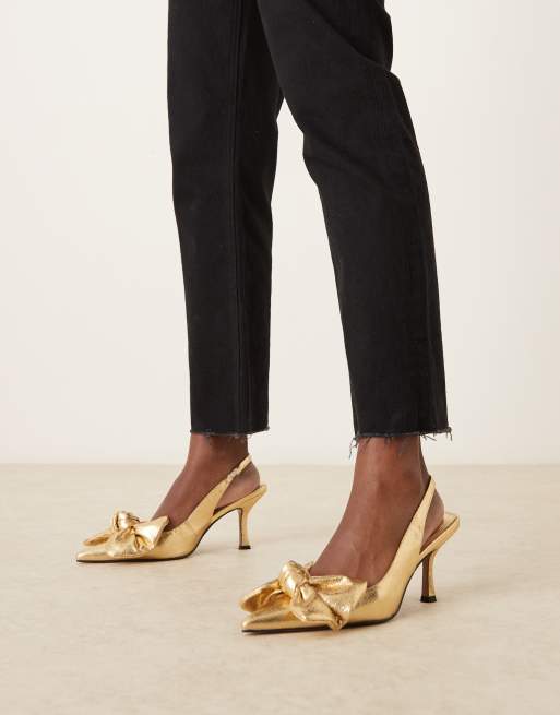 ASOS DESIGN Saffron Scarpe dorate con tacco medio e fiocco ASOS