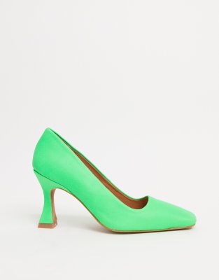 green leather pumps