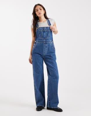 ASOS DESIGN - Salopette en jean - Bleu moyen