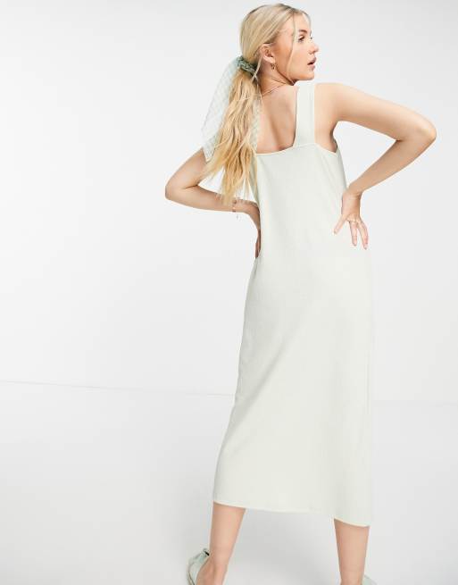ASOS DESIGN – Salviagrön axelbandsklänning i midilängd med textur och hornknappar , 2 av 4