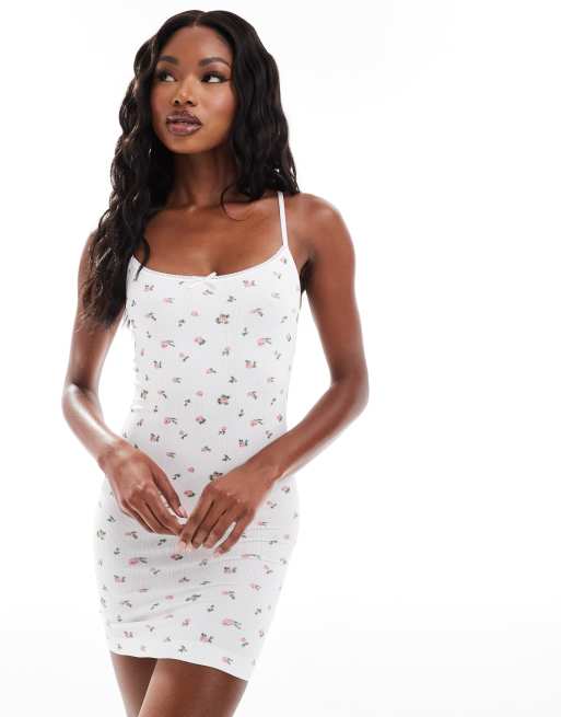 ASOS DESIGN – Samira – Minikleid aus Pointelle mit Blümchenmuster