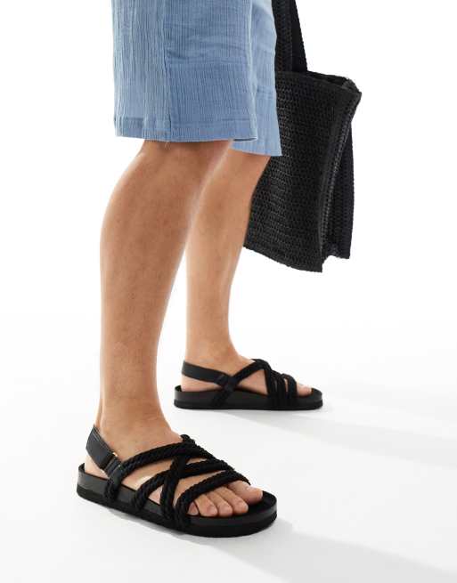 FhyzicsShops DESIGN – Sandalen in Schwarz mit überkreuzten Riemen im Seil-Design