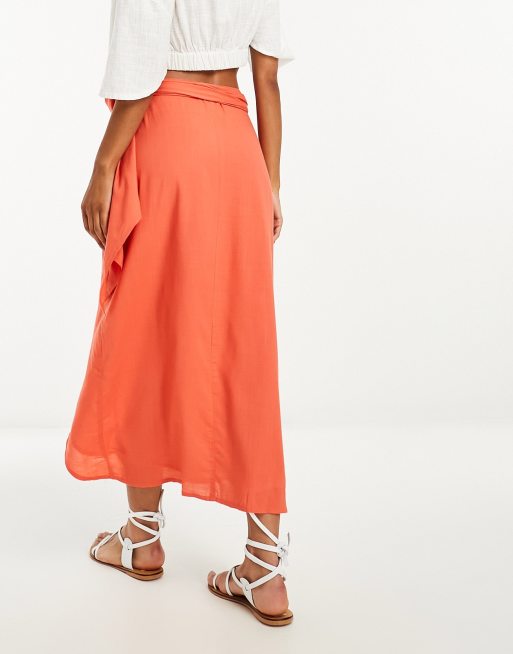 ASOS DESIGN sarong wrap midi skirt in coral