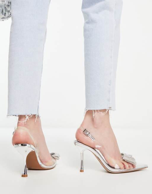 ASOS DESIGN Sass Chaussures talon aiguille mi haut et bride arri re avec n ud ornement Transparent