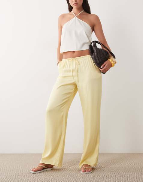 ASOS DESIGN - Satijnen broek met wijde pijpen en elastische taille in lichtgeel - view 1
