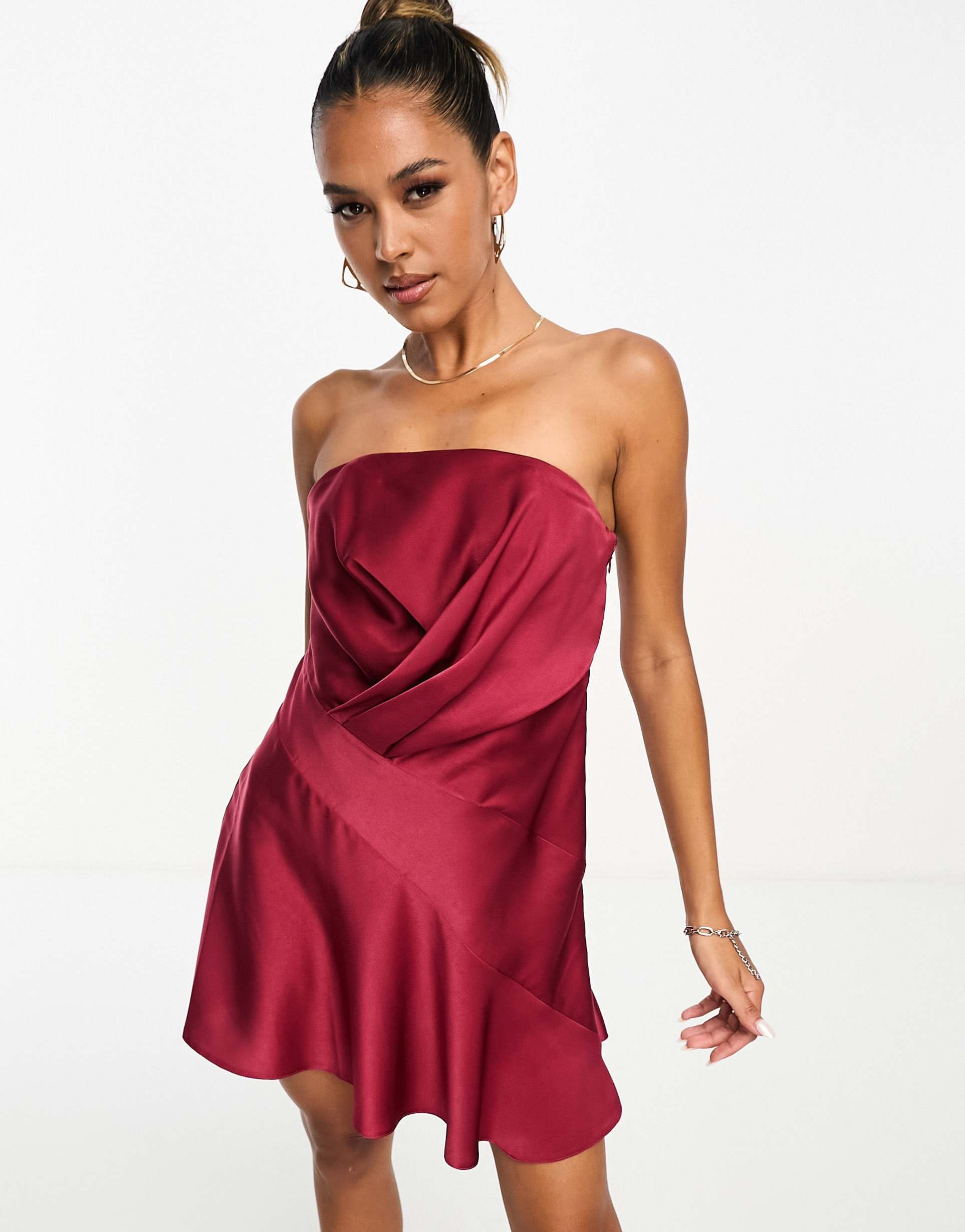 asos design satin bandeau asymmetric hem mini dress with ruched bodice detail in burgundy