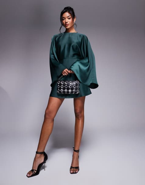 ASOS DESIGN satin batwing playsuit with skort detail in forest green