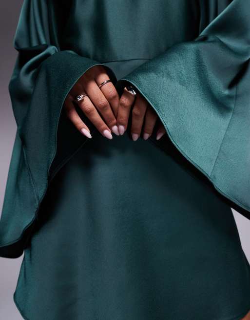 ASOS DESIGN satin batwing romper with skort detail in forest green