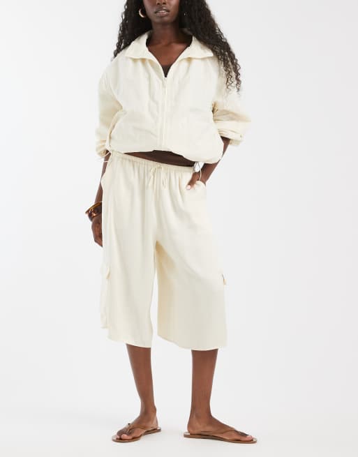 ASOS DESIGN satin bermuda cargo shorts in ecru, 2 of 5
