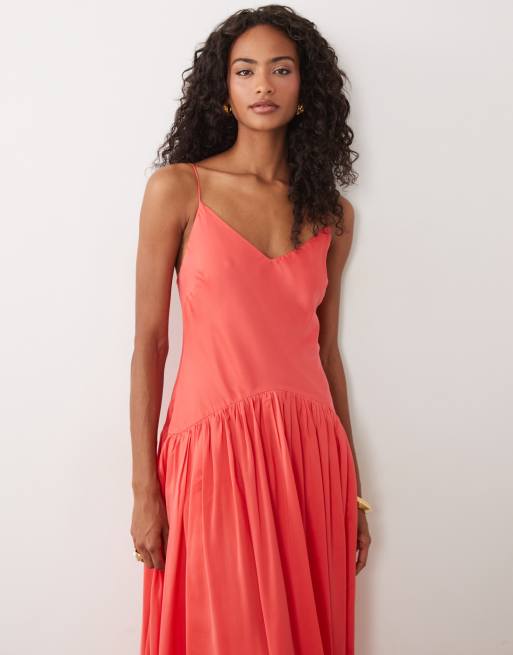 coral cocktail dress Metallic Sleeveless Shift Crafted with a daring front cut Pink Lily Coralie Coral Tropical