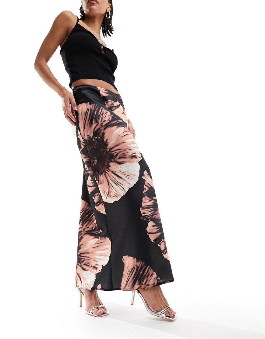 ASOS DESIGN satin bias maxi skirt in large placement floral-Multi