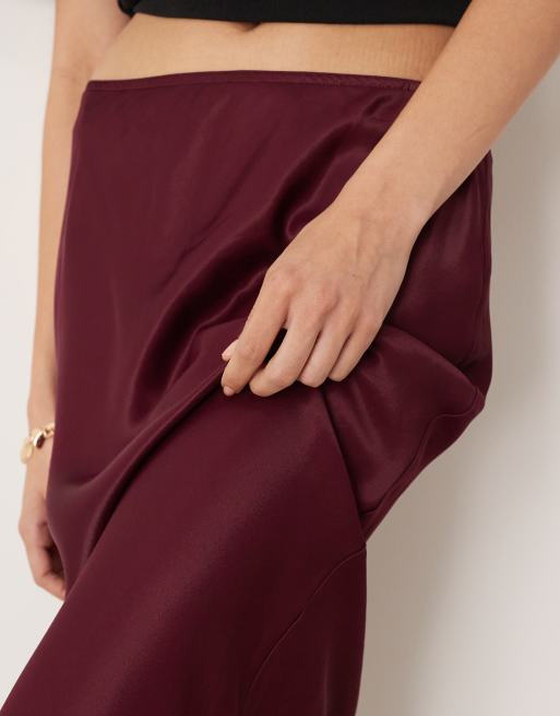 ASOS DESIGN satin bias maxi skirt in plum