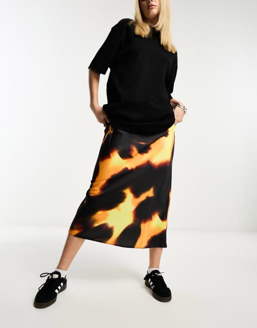 ASOS DESIGN satin bias midi skirt in dark yellow abstract print