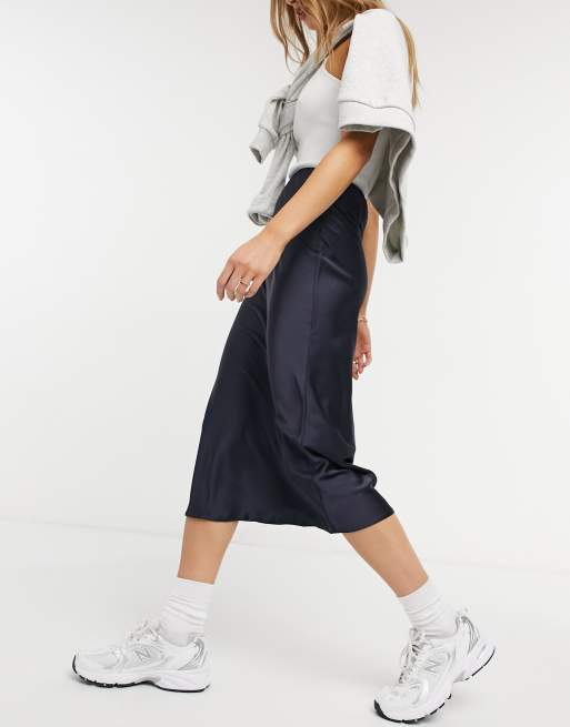 ASOS DESIGN satin bias midi skirt in navy