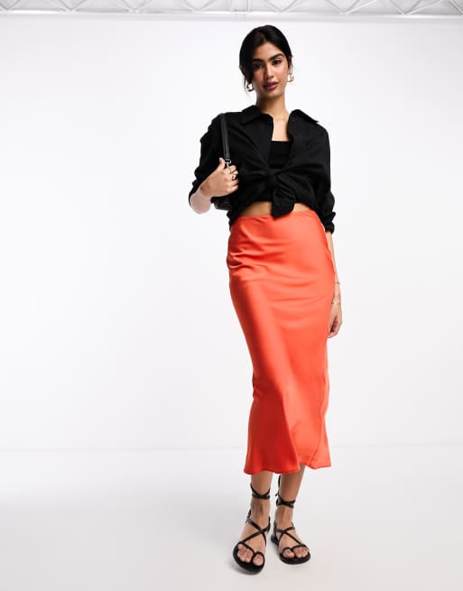 ASOS DESIGN satin bias midi skirt in orange