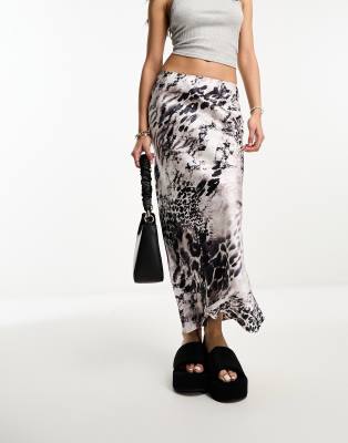 ASOS DESIGN satin bias midi skirt in snake print