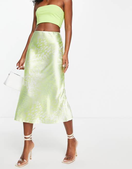 ASOS DESIGN satin bias midi skirt in yellow leopard print