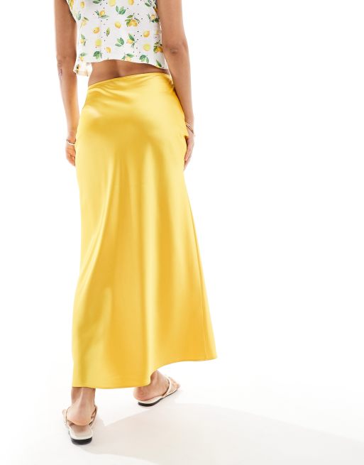 ASOS DESIGN satin bias midi skirt in yellow