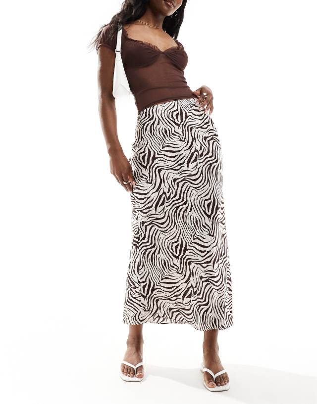 ASOS DESIGN - satin bias midi skirt in zebra print