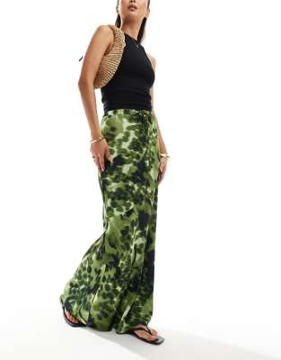 satin bias tie waist maxi skirt in green animal print