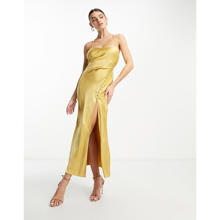 ASOS DESIGN satin button front maxi dress with lace up back detail in gold