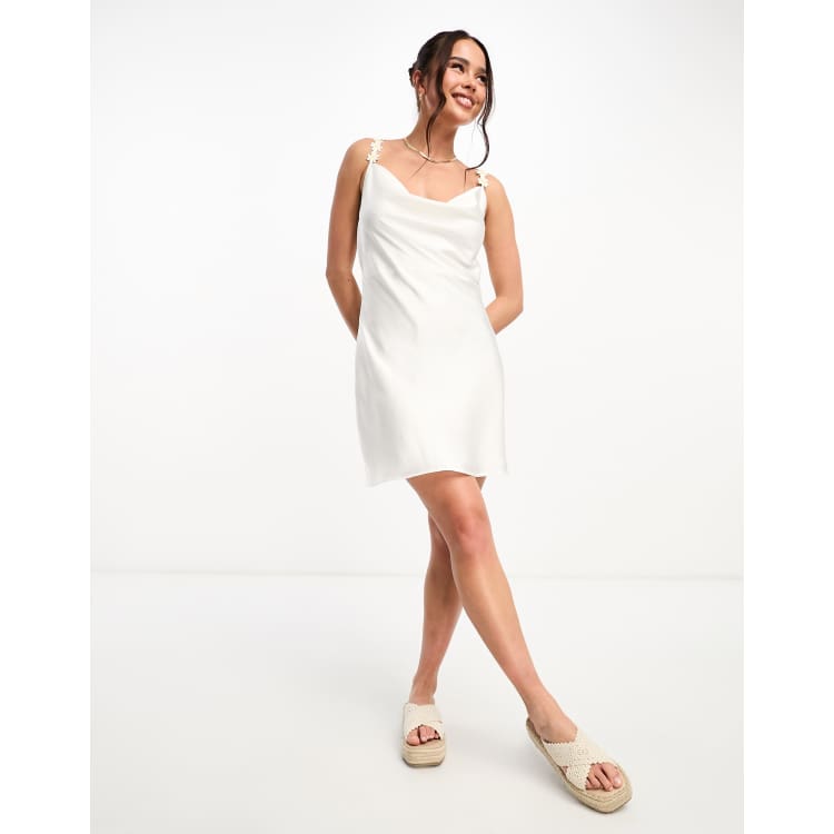 ASOS DESIGN satin cowl neck mini slip dress with daisy trim straps in ivory