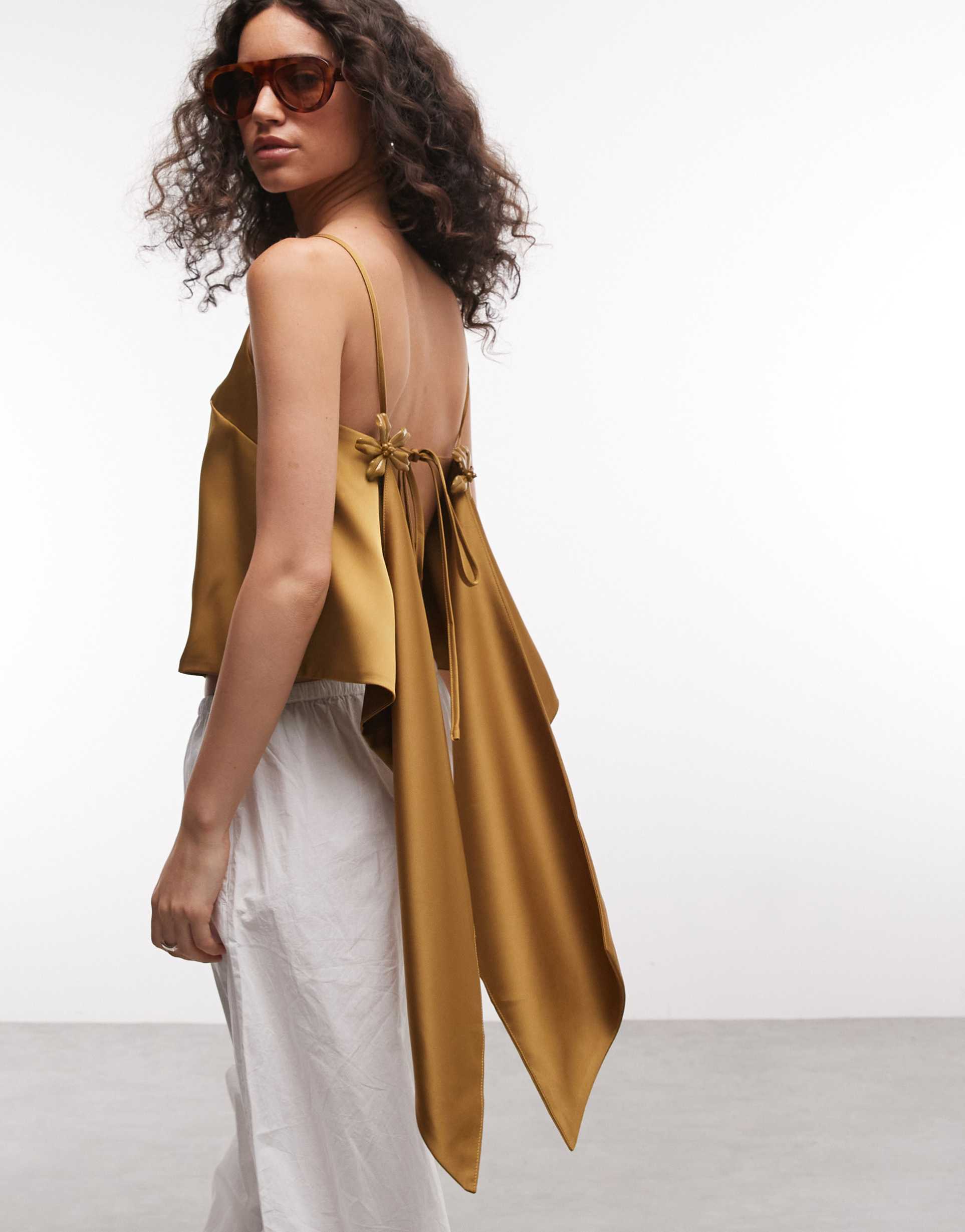 asos design satin flower detail open back cami in gold