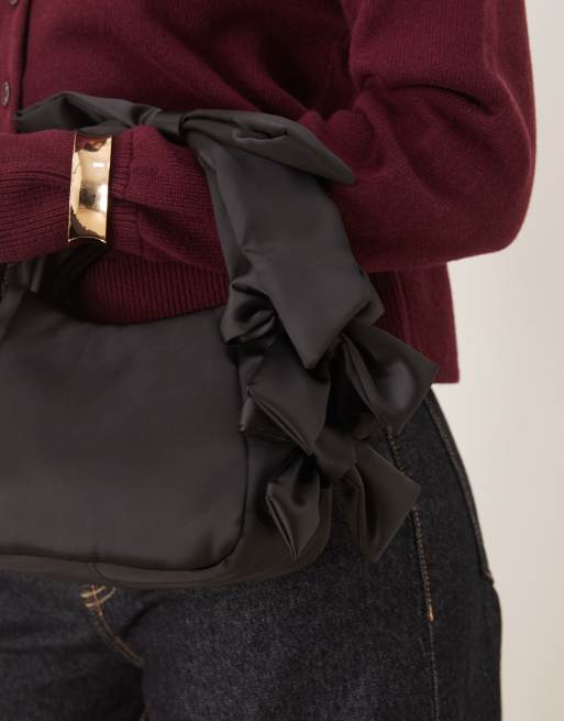 ASOS DESIGN satin grab clutch bag with bow detail in black, 2 of 4