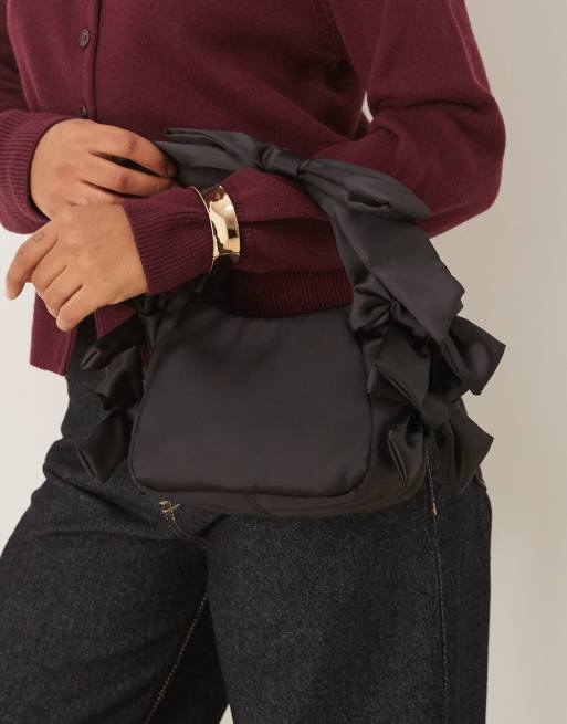 ASOS DESIGN satin grab clutch bag with bow detail in black, 4 of 4