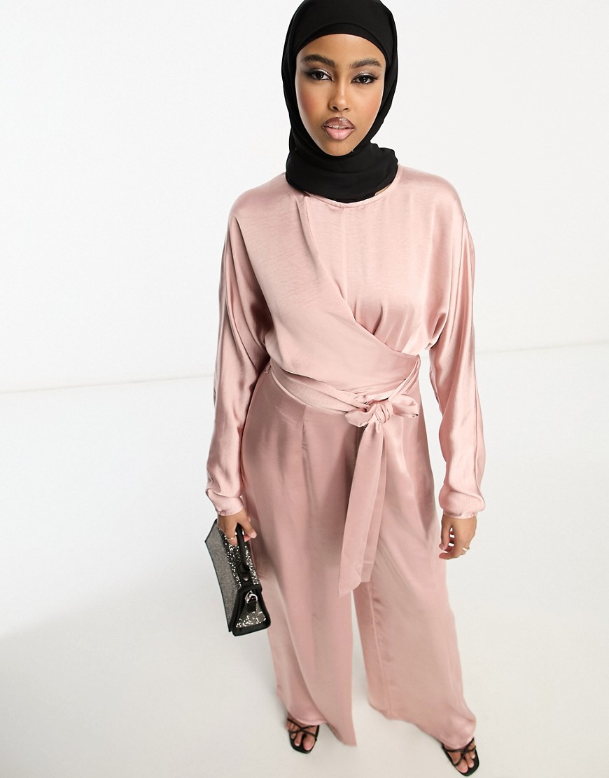 ASOS DESIGN satin jumpsuit with batwing sleeve and wrap waist in pale pink