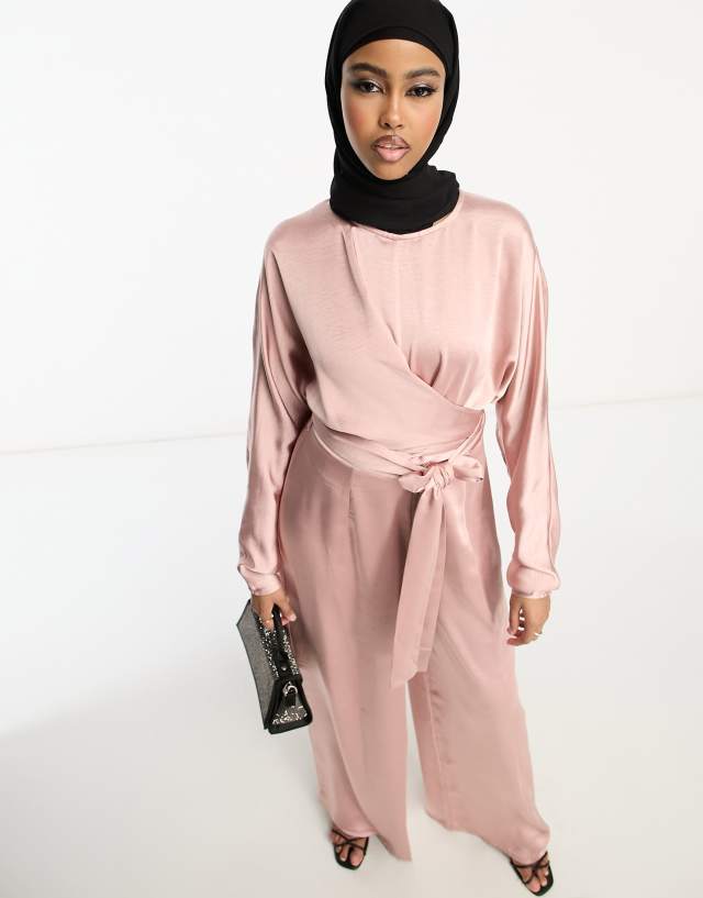 ASOS DESIGN satin jumpsuit with batwing sleeve and wrap waist in pale pink