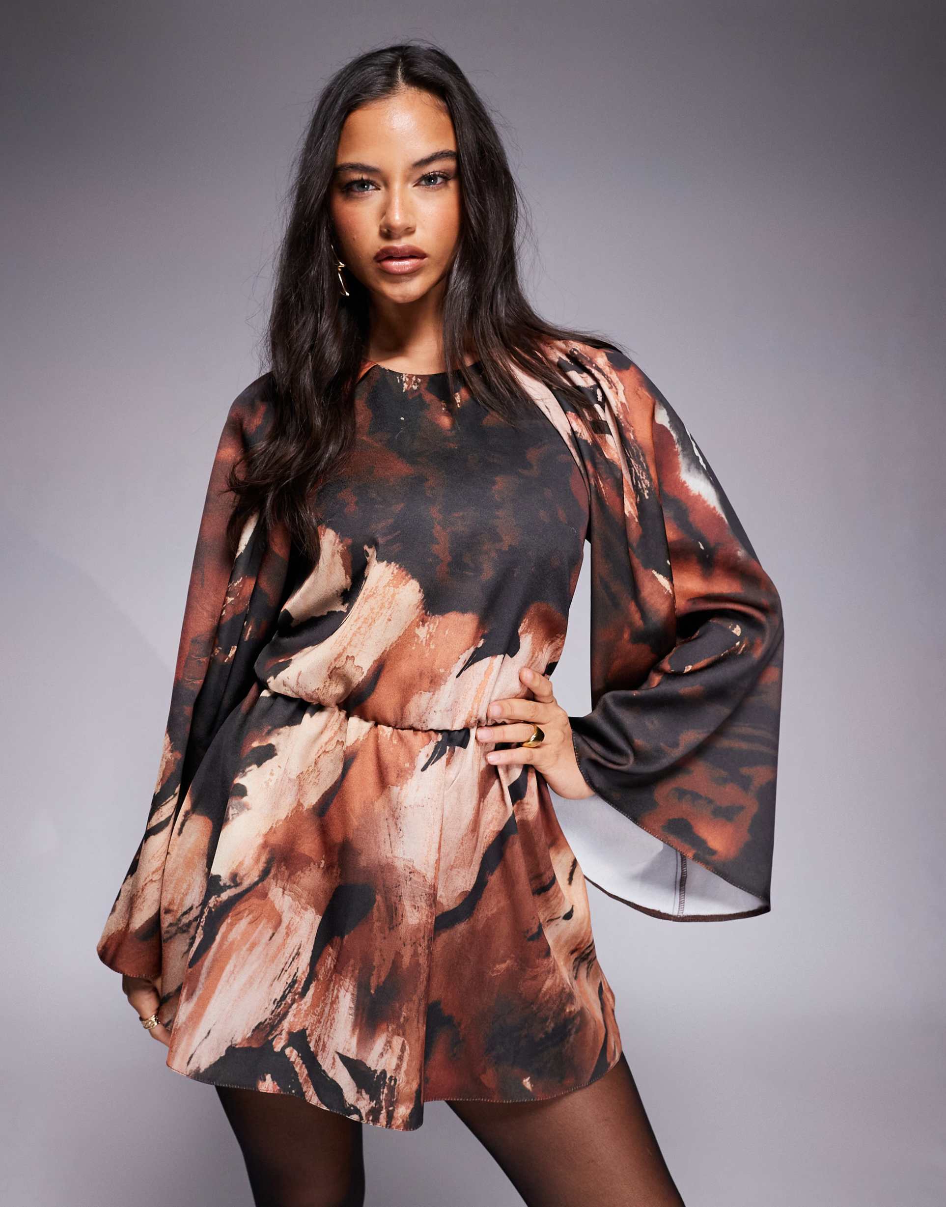 asos design satin long sleeve high neck romper in dark abstract print