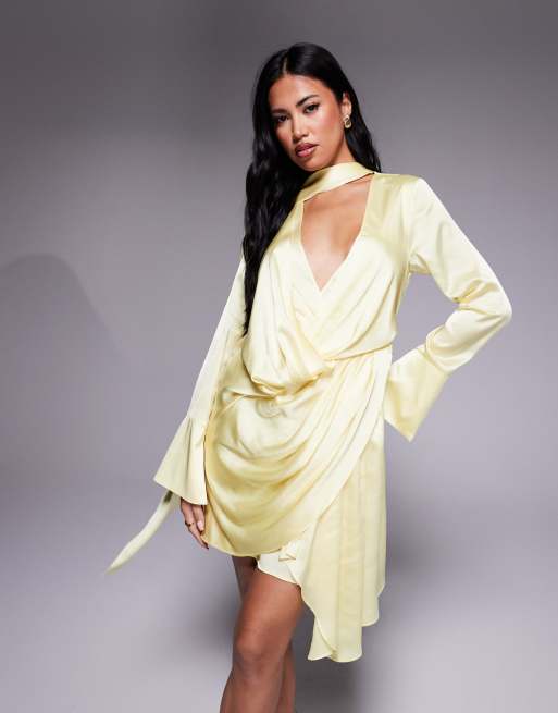 ASOS DESIGN satin long sleeve plunge mini dress with drape neck scarf and wrap skirt in lemon yellow