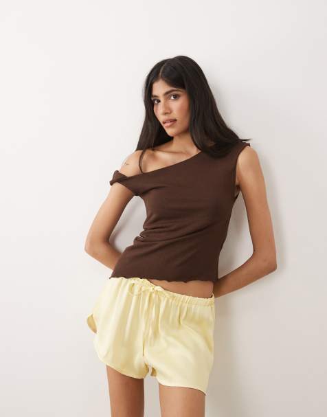 ASOS DESIGN satin micro running shorts in buttermilk - view 1