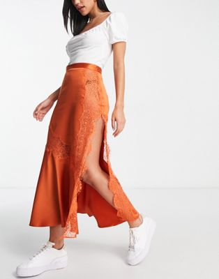 ASOS DESIGN satin midi slip skirt with lace inserts in orange