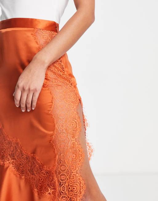 ASOS DESIGN satin midi slip skirt with lace inserts in orange