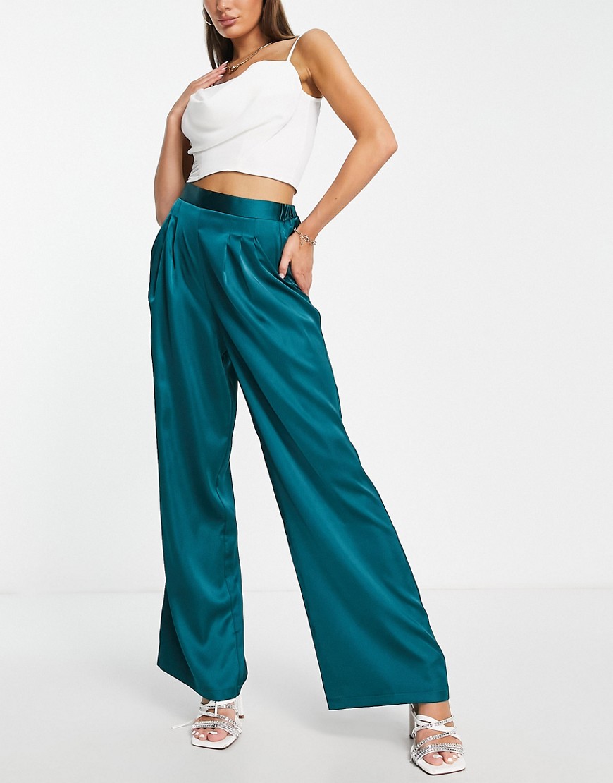ASOS DESIGN satin pants with pleat detail in pine green