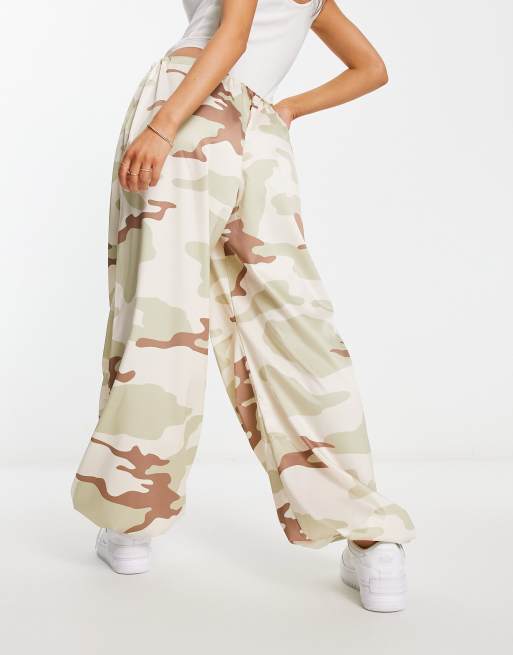 ASOS DESIGN satin parachute pants in camo | ASOS