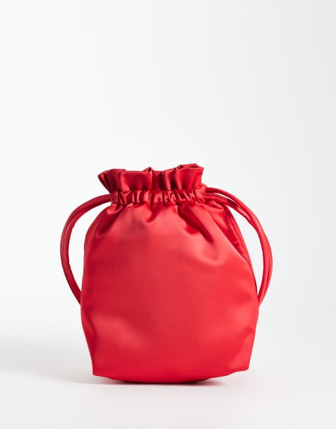ASOS DESIGN satin pouch with detachable crossbody strap in red - view 1