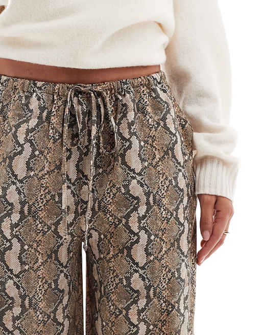 ASOS DESIGN satin pull-on pants in snake print | ASOS ASOS DESIGN satin pull-on pants in snake print | ASOS